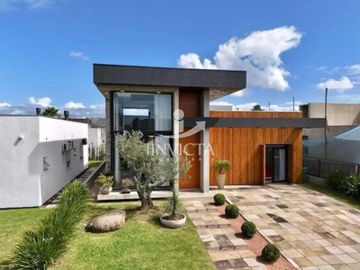 Casa Térrea em Condomínio de 4 suítes Mobiliado para Venda Bairro Zona Nova Capão da Canoa — foto 1